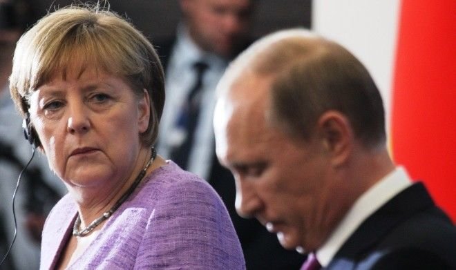 Путин осудил миграционную политику Меркель